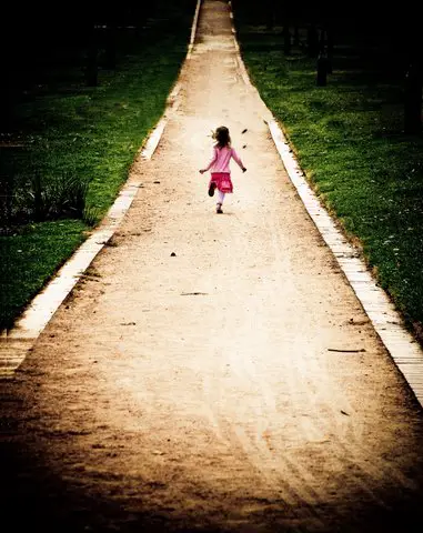 Child walking in the road