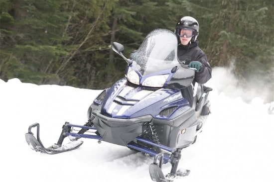 Blazing through the snow on a snowmobile