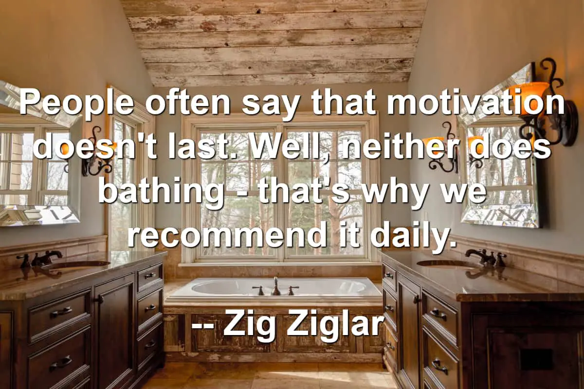 Gorgeous bathroom and bath tub with Zig Ziglar quote