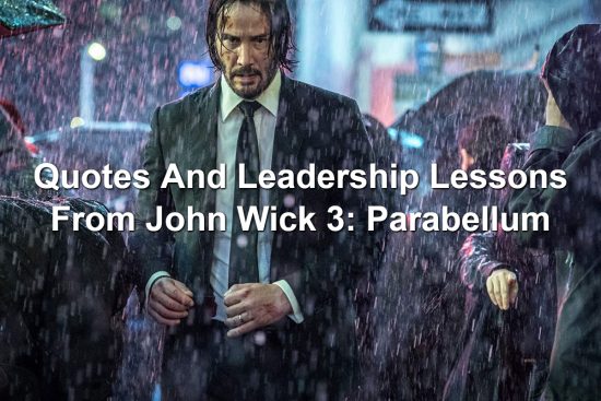 John Wick standing in a downpour