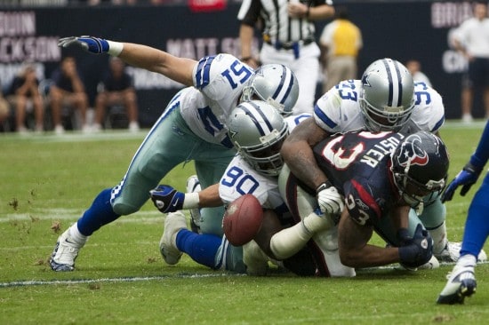 Houstan Texans and Dallas Cowboys football fumble Houstan Texans and Dallas Cowboys football fumble