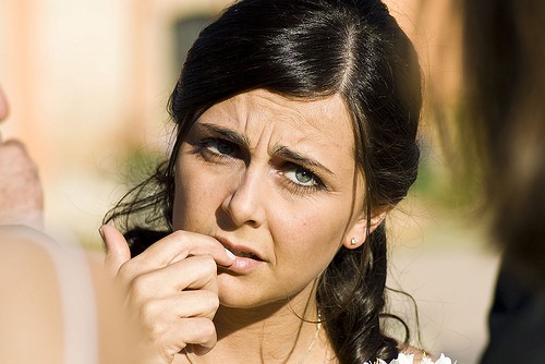 Woman with a worried look on her face