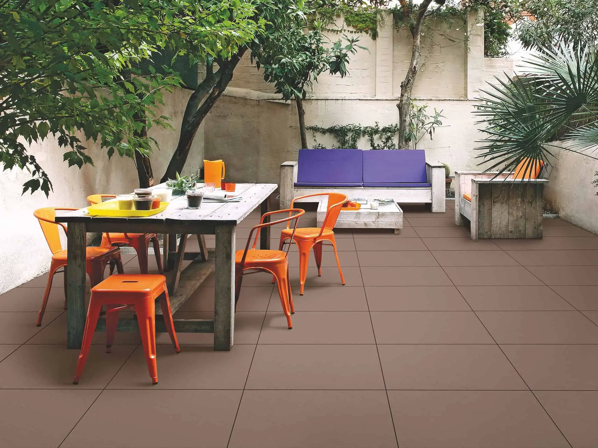outdoor patio set on a tile floor