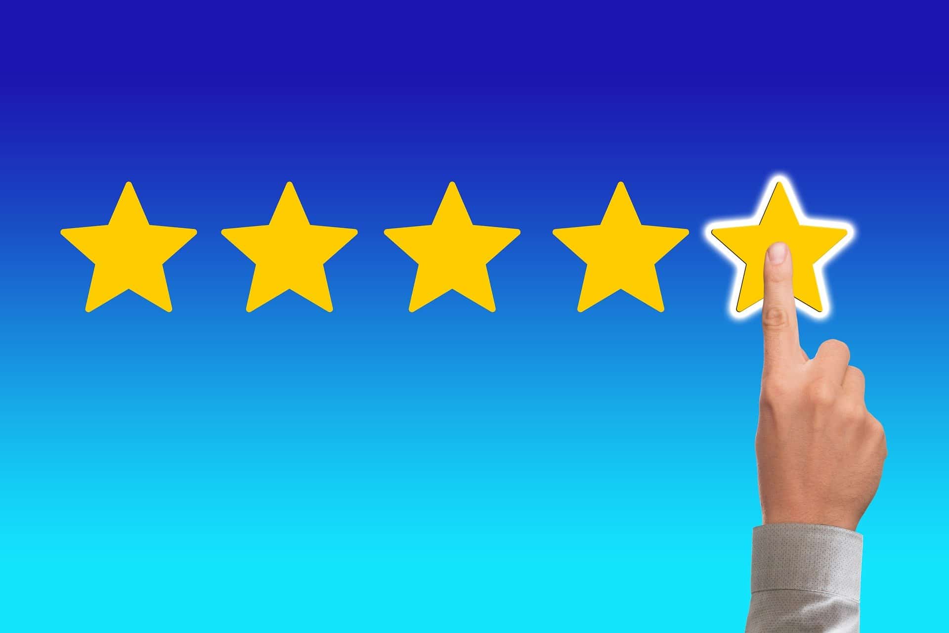 Finger touching 5 star review