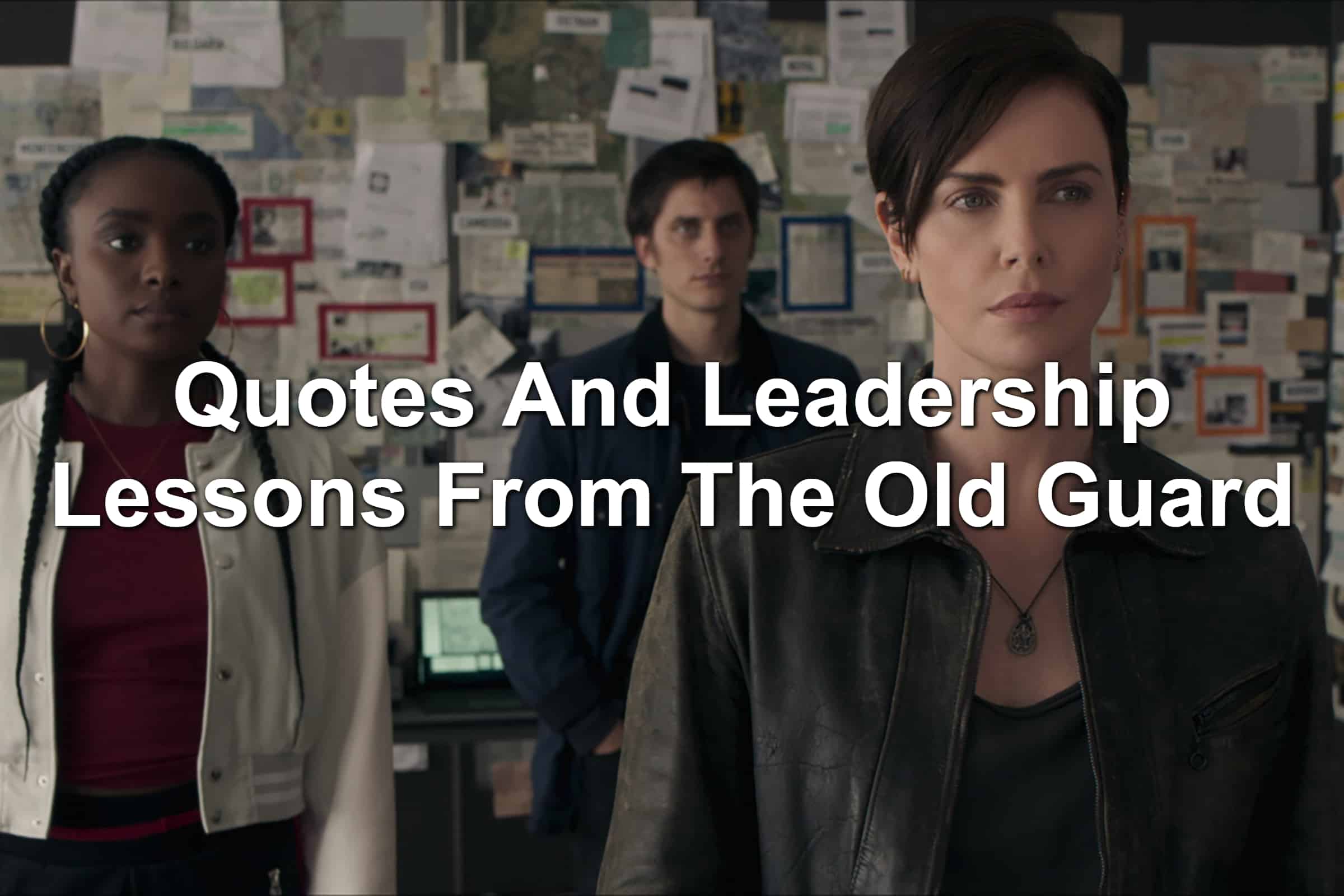 Charlize Theron, KiKi Layne, and Luca Marinelli standing in front of a board of notes in The Old Guard