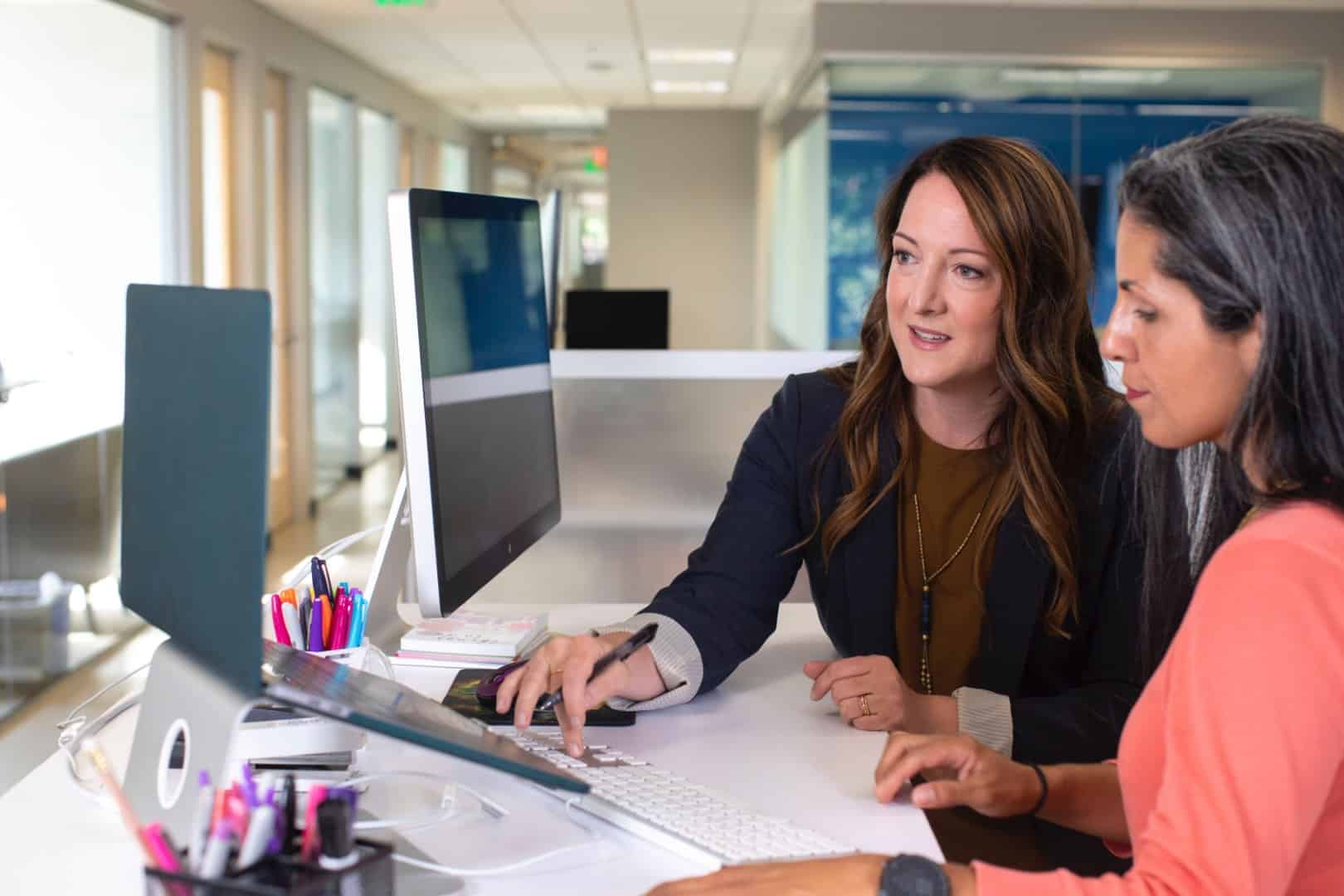 Woman teaching another woman