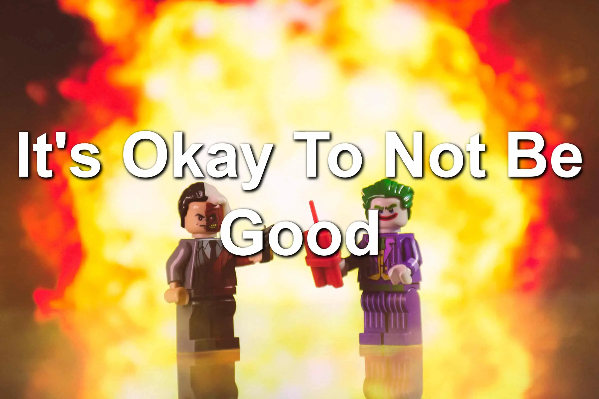 Lego figures of Batman villains Two-Face and Joker blowing something up (Explosion in background)