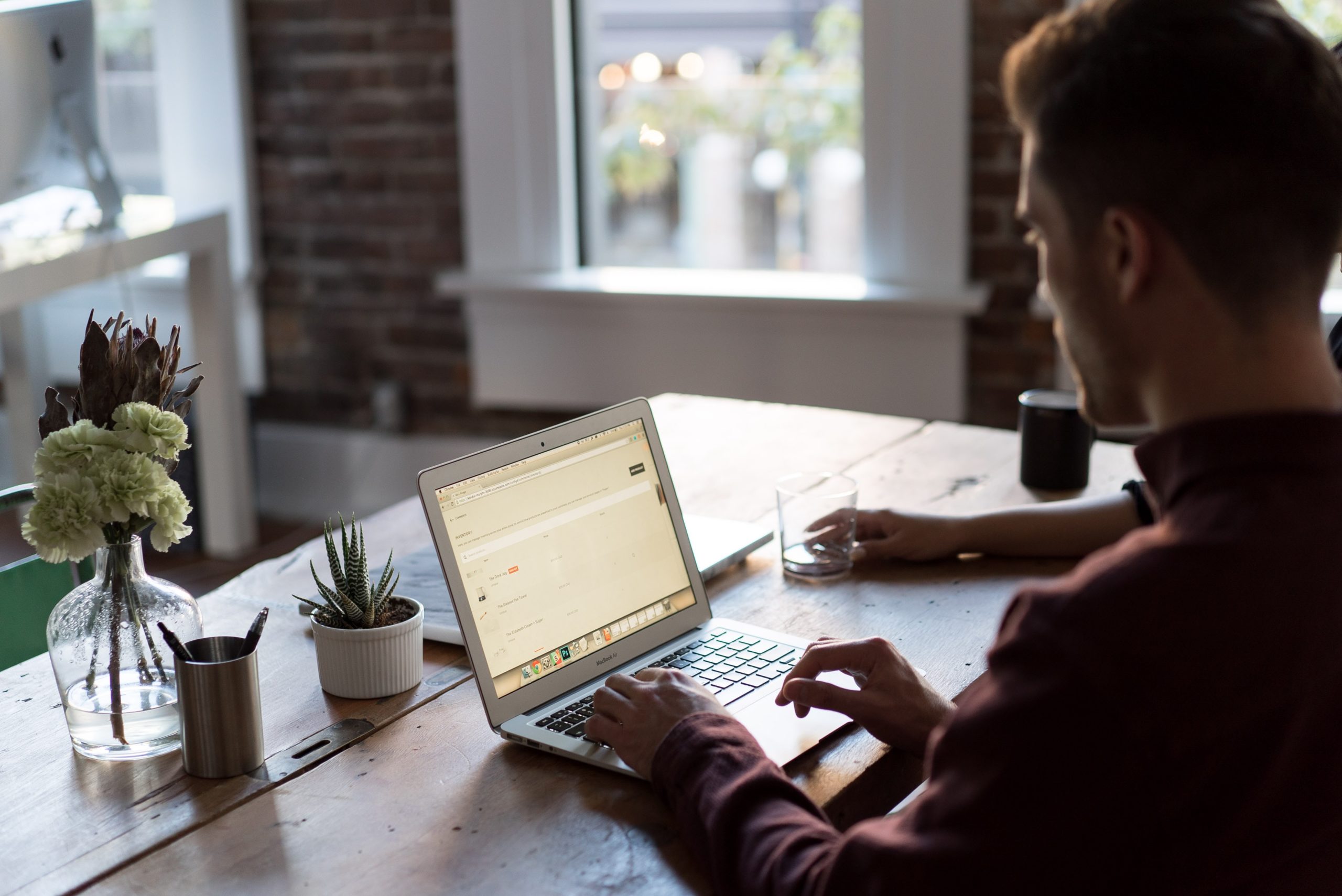 Man sitting at a laptop