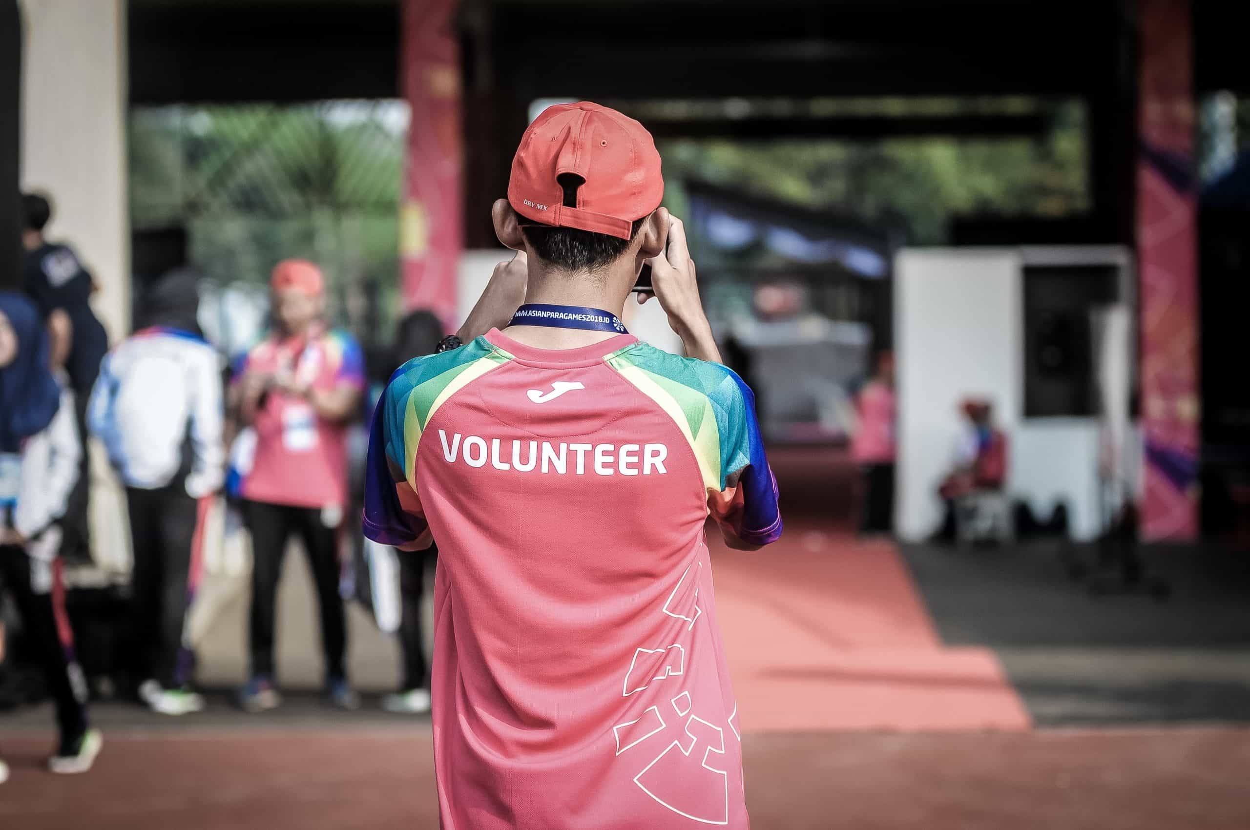 Man with a volunteer shirt