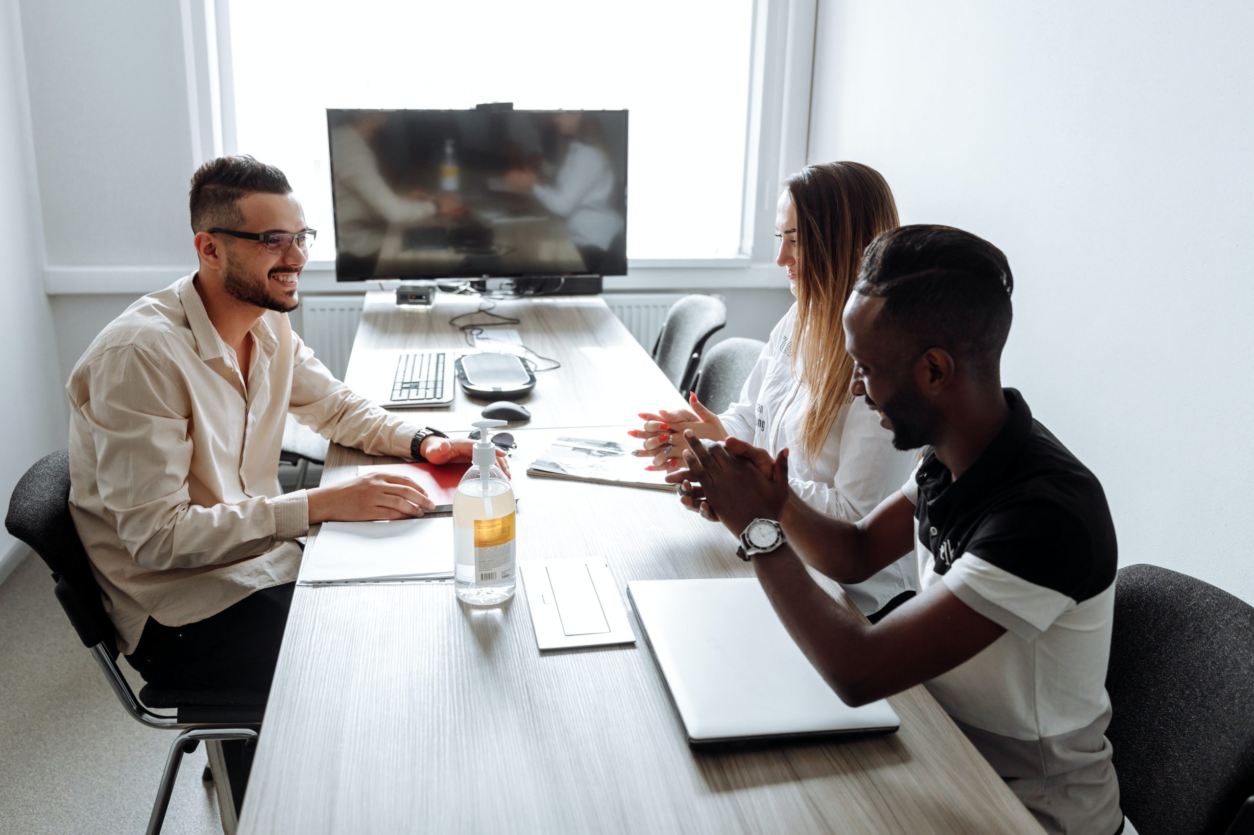 People sitting around a conference table