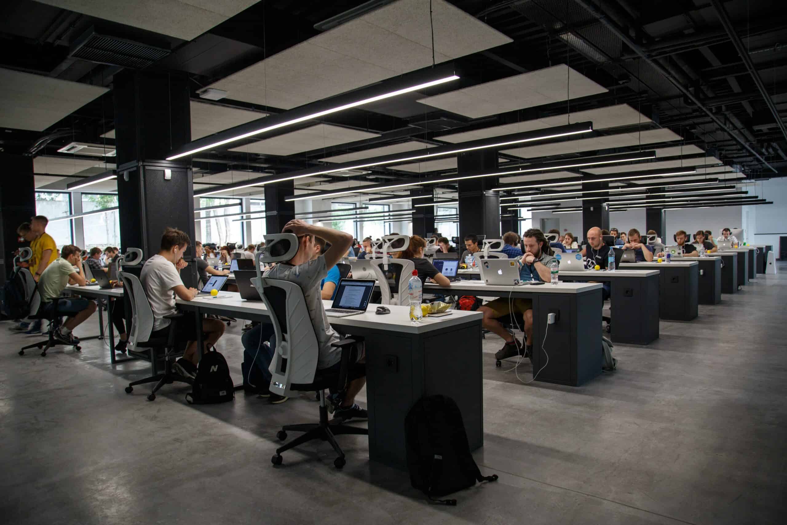 People working in an open office setting
