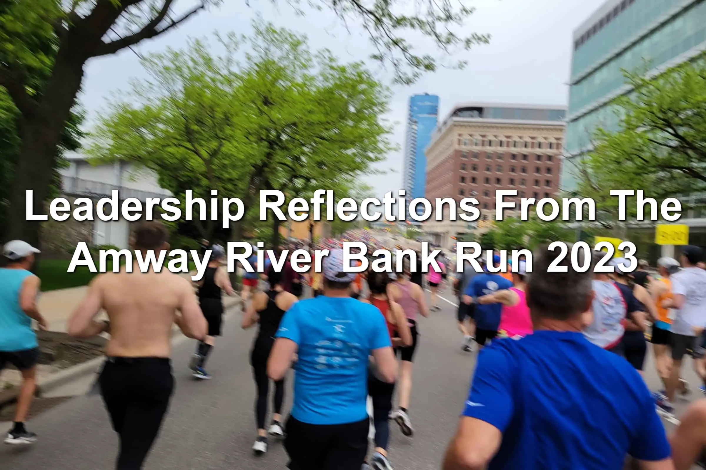 Runners running the streets of Grand Rapids, Michigan for the 46th annual Amway River Bank Run