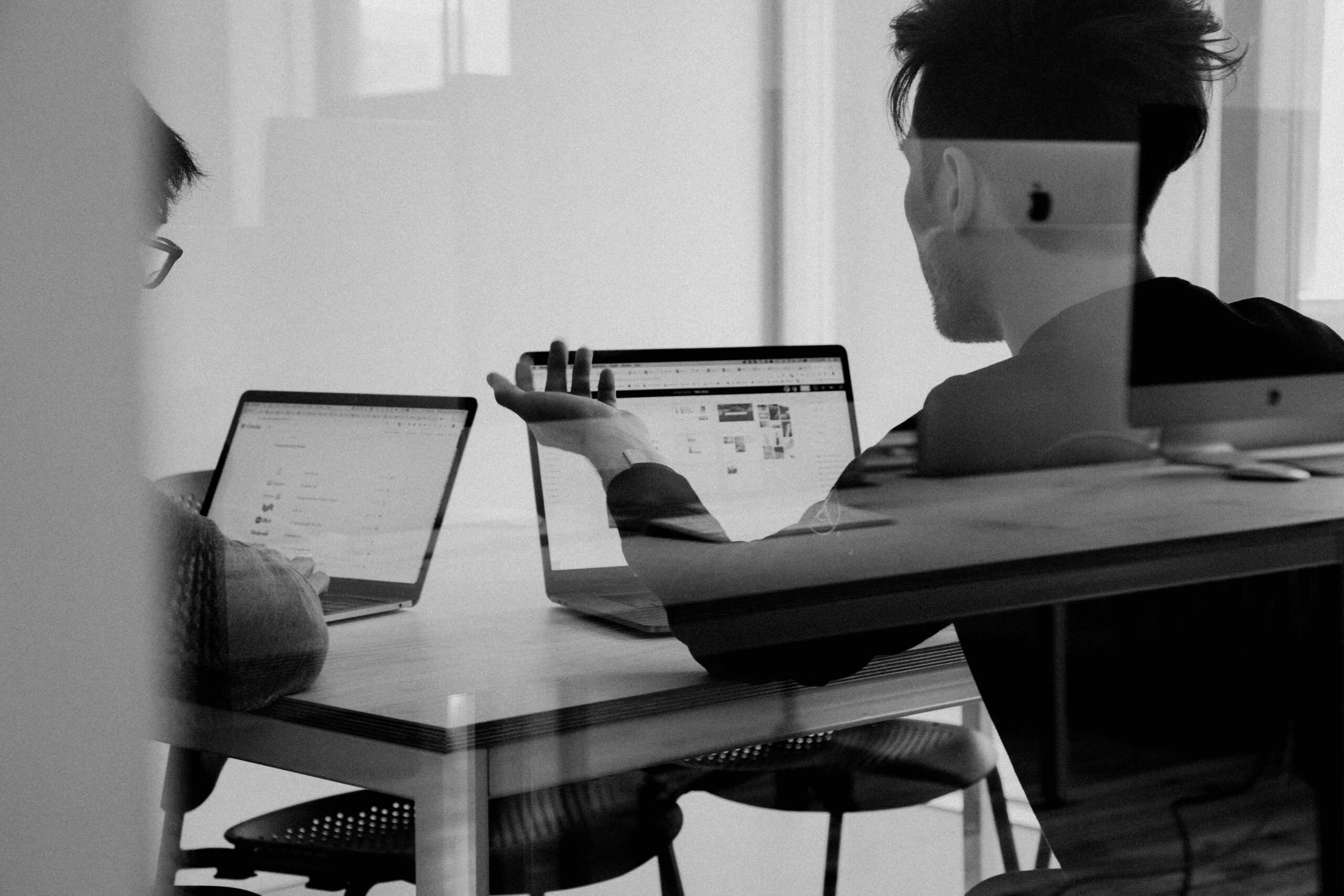 Man using a Mac Book computer