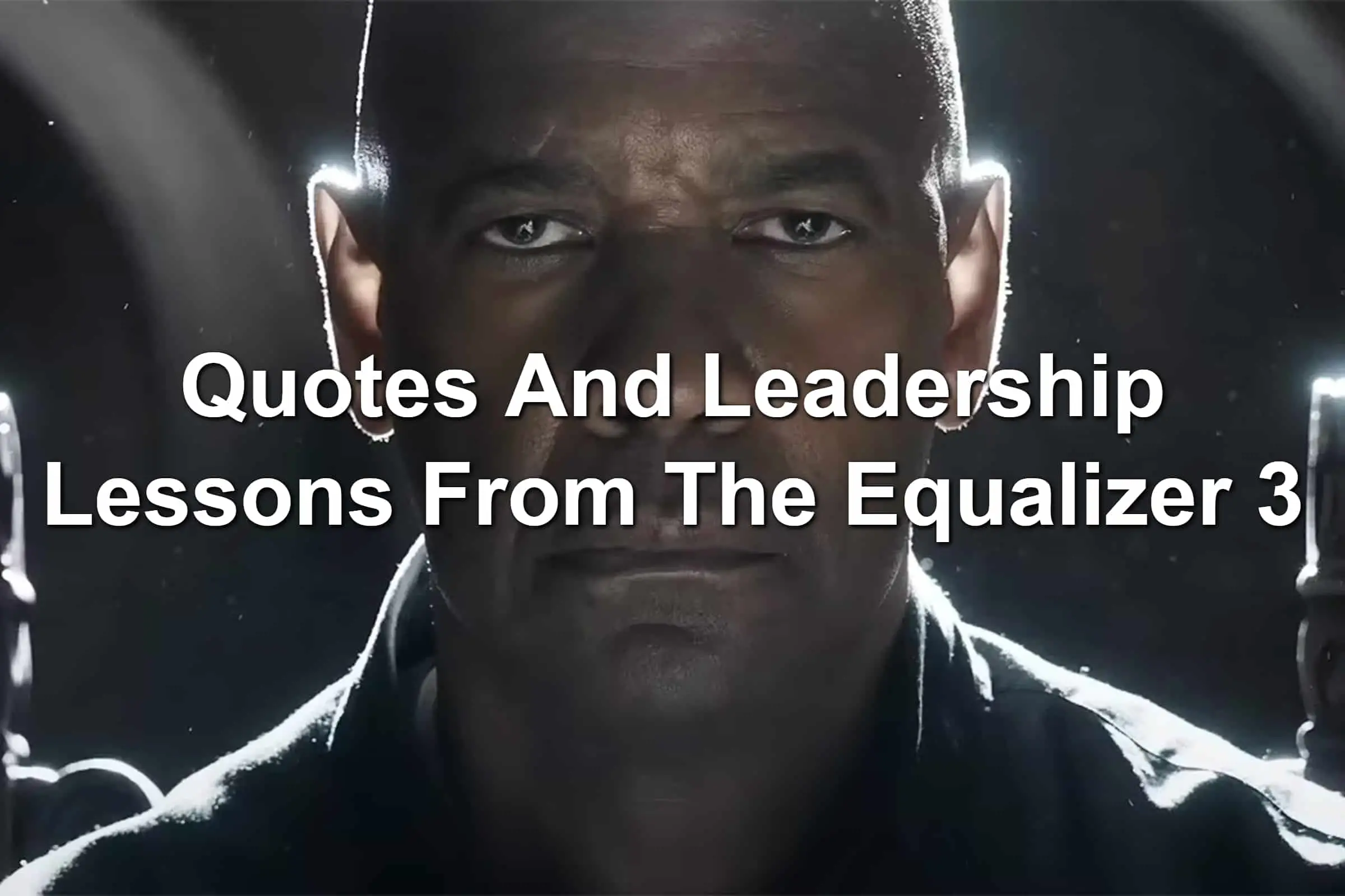 Denzel Washington in The Equalizer 3 movie. He's sitting in a chair, held captive by mobsters.