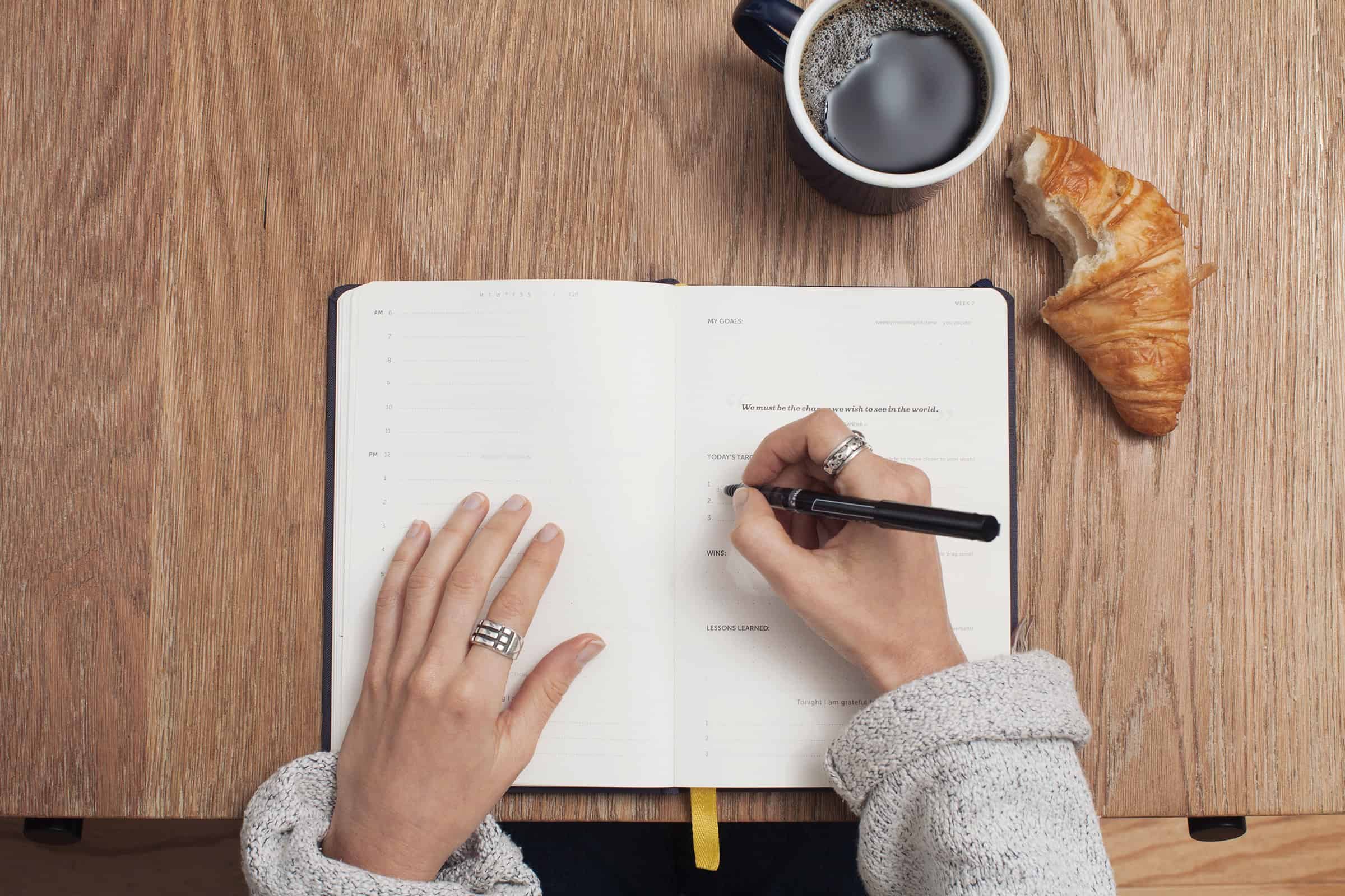 Person writing in a journal